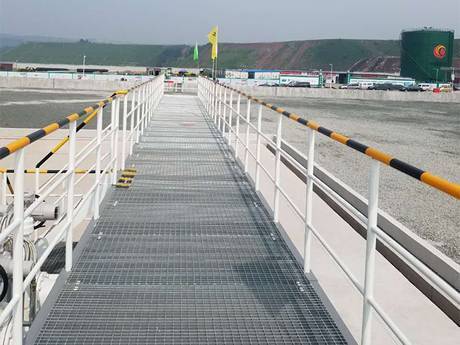 It is a steel bar grating walkway which located in airport tank farm.