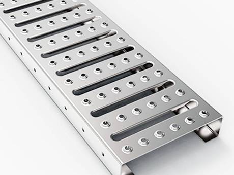 A interlocking safety grating with serrated surface.