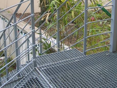 This is steel grating stairs outdoor.