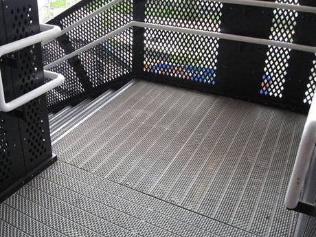 Traction-Grip safety grating is used as stair treads to enhance non-slip performance.