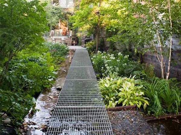 ADA compliant grating used on outdoor garden walkways