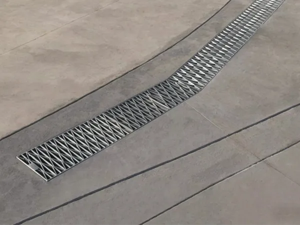 Anti-slip diamond pattern steel grating for safety ramp installation.