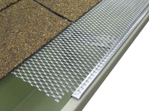 Expanded aluminum gutter guard is installed above the roof gutter system.