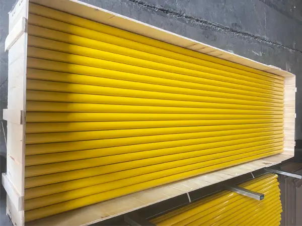 Grating ball joint stanchions are packed in a wooden crate.