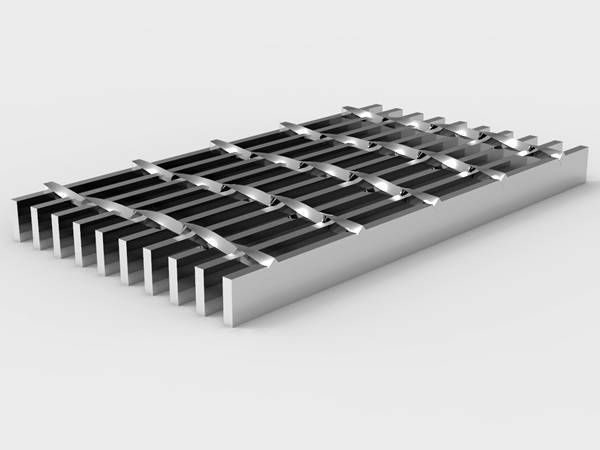 A piece of heavy duty stainless steel grating on gray background.