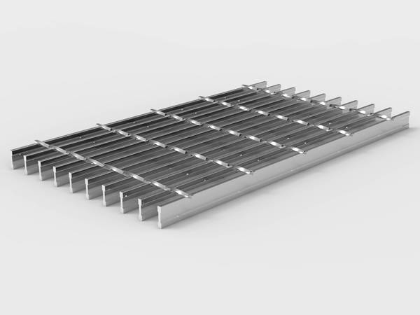 A piece of I bar stainless steel grating on gray background.