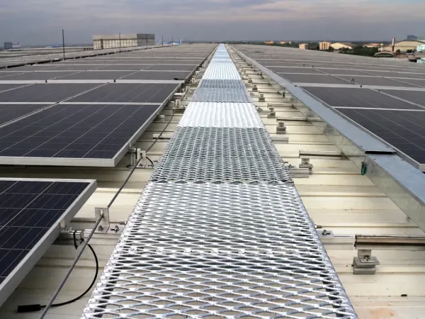 Rooftop solar panel walkways between PV rows