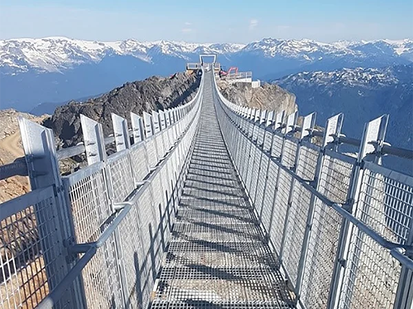 Steel grating is installed on high altitude pass bridge.