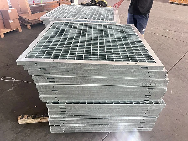 Many steel grating stocked together.
