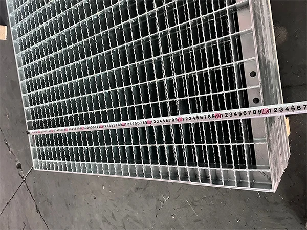 Measure the steel grating width with a tape.
